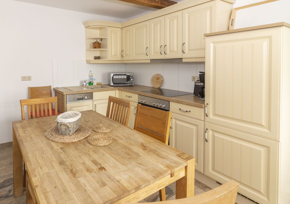 Vollausgestattete Küche einer Ferienwohnung im Mühlenhof